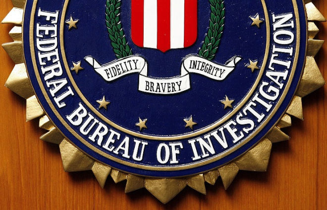 Ex-official says FBI chief may have to resign over Clinton email case