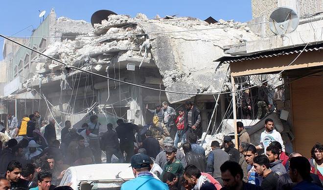 Syria arms depot explosion kills at least 14