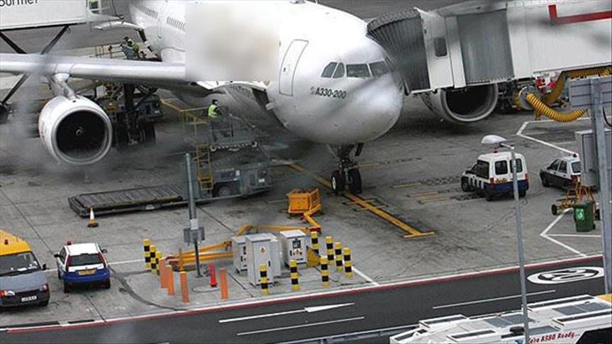 Suspicious item shuts busy UK airport terminal