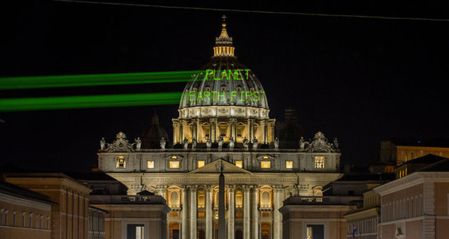 Activist message projected on St.Peter’s dome in Vatican