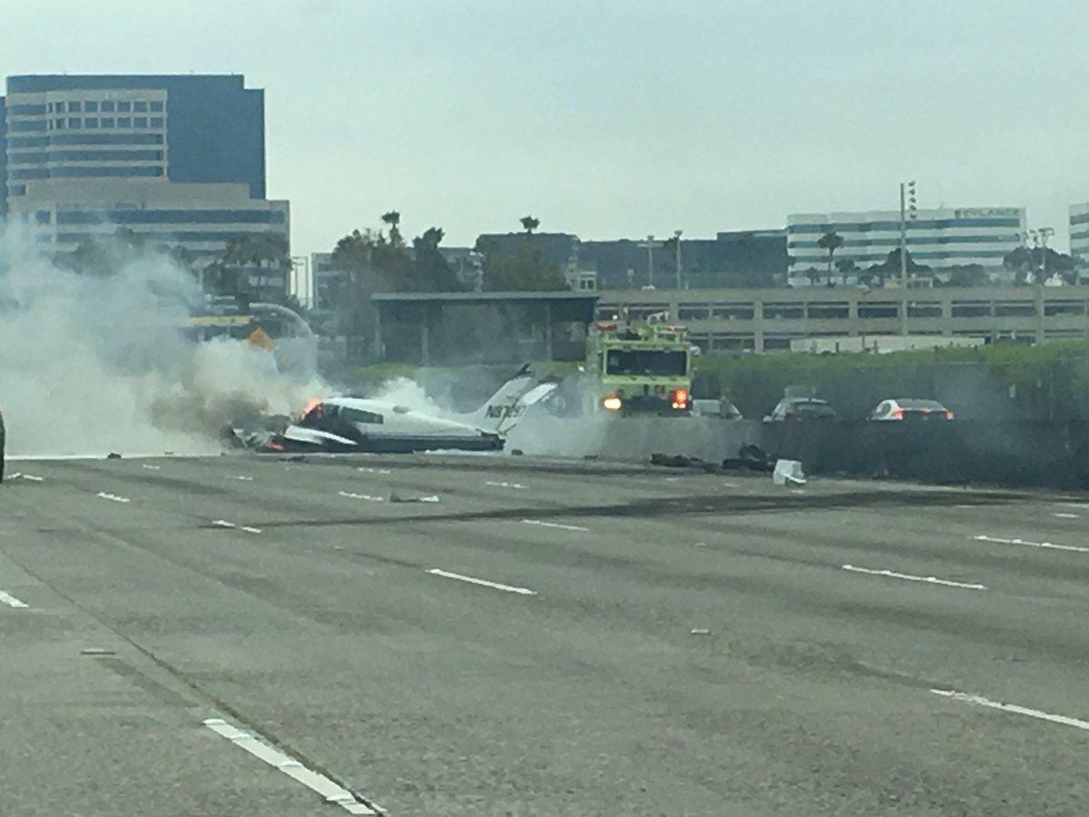 Small plane crashes onto California freeway