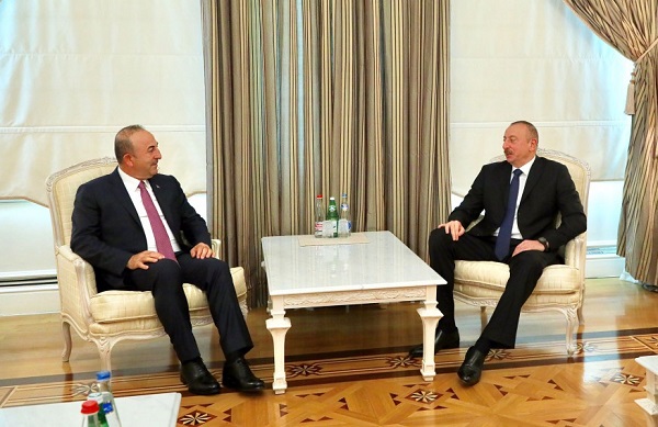 Ilham Aliyev awards Turkish FM with Dostlug Order -