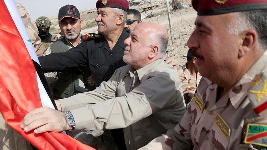 Abadi raises Iraqi flag in Al-Qaim west of country