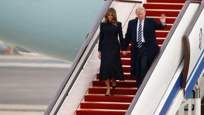 Trump lands in China for talks with Xi