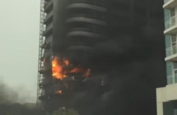 Fire in Dubai's skyscraper, smoke coming from Zen Tower