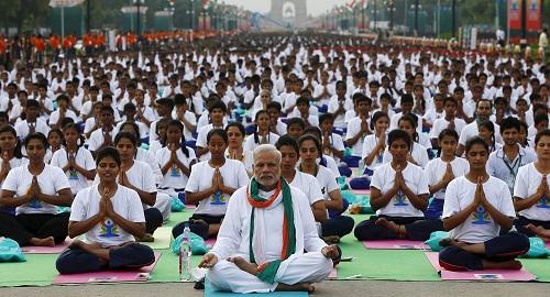 Indian PM Modi performs asanas outdoor for int'l Yoga Day