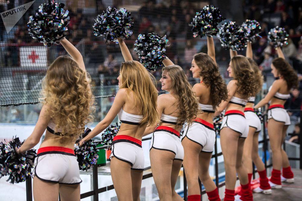 Russian Cheerleaders' shocking striptease routine -