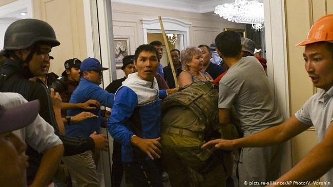 Police begin to disperse supporters of ex-president