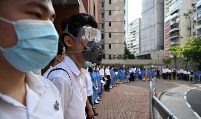 Masked protesters occupy Hong Kong city center