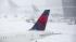 U.S. storm grounds flights, forces state of emergency
