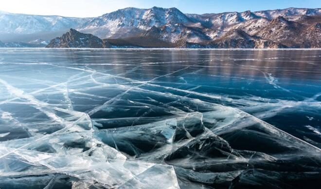 Car falls through ice on Lake Baikal, killing tourists