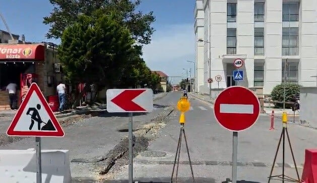 Deponun içindən sakinlər üçün yol çəkildi - Video