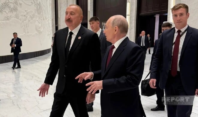 İlham Əliyev Putinlə ayaqüstü görüşdü - Video