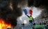 Paris engulfed in smoke amid mass protests - Video