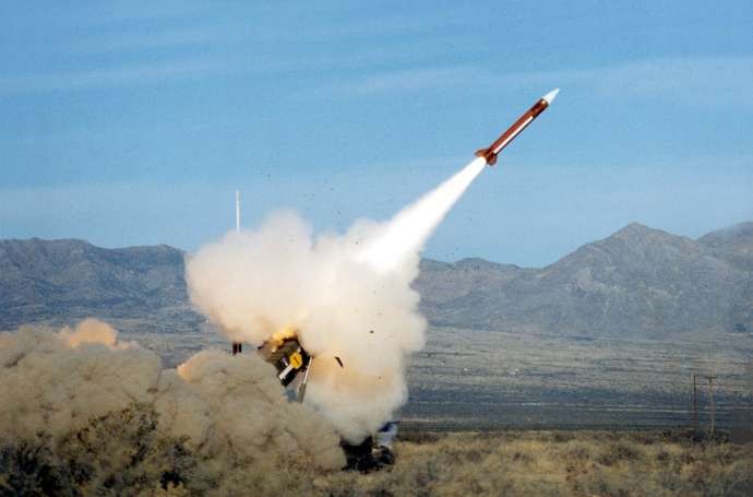 Kim Çenin Yaponiyanı vurmağa hazır min raketi