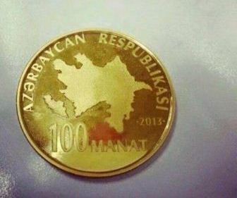 The first photo of Gold 100 manat spread