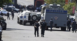 Armed men seized police station released 2 more hostages