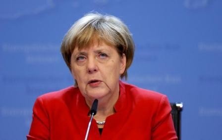 Merkel threatens Putin with sanctions